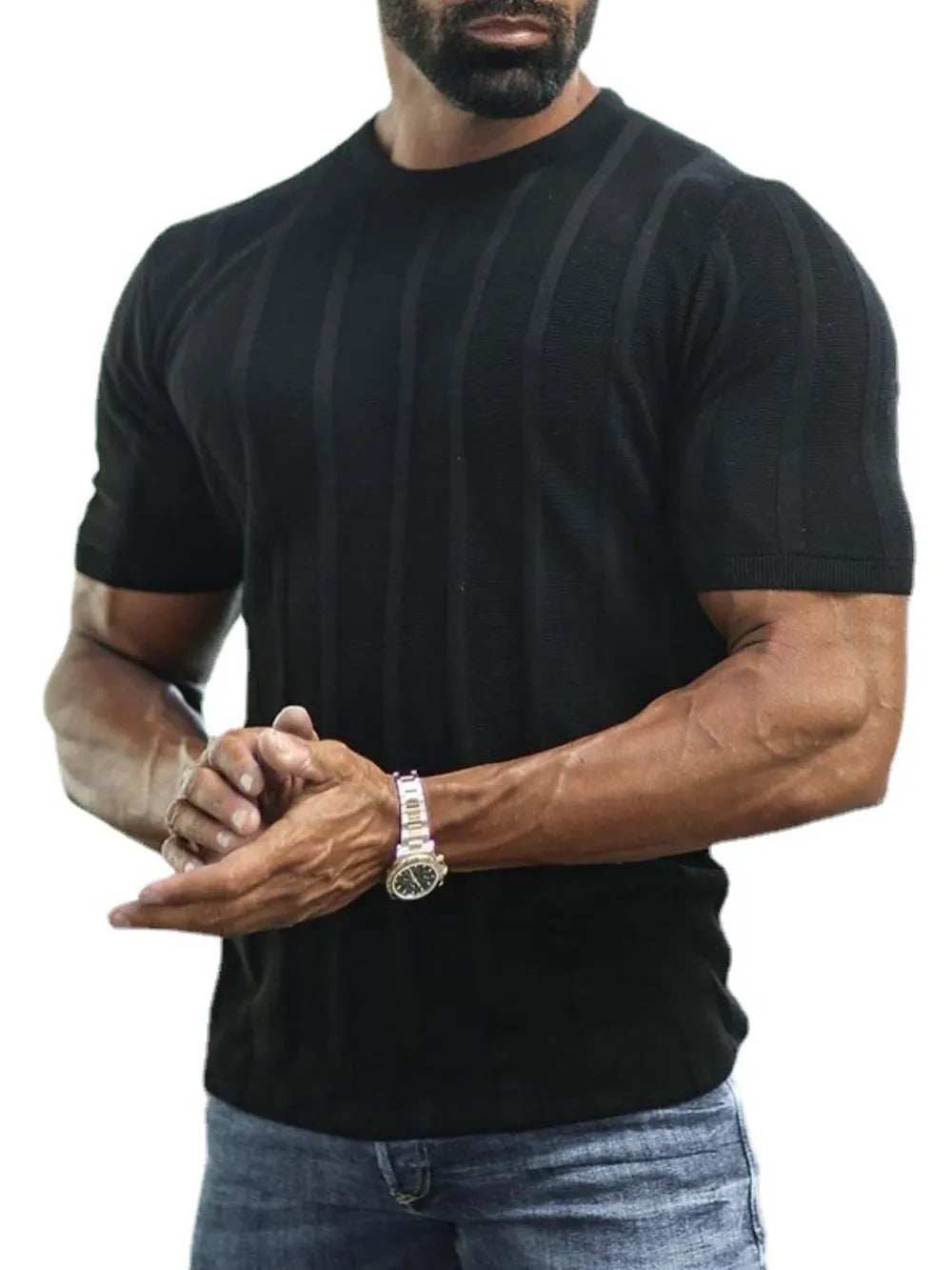 Black ribbed knit tee with vertical stripe texture and short sleeves.