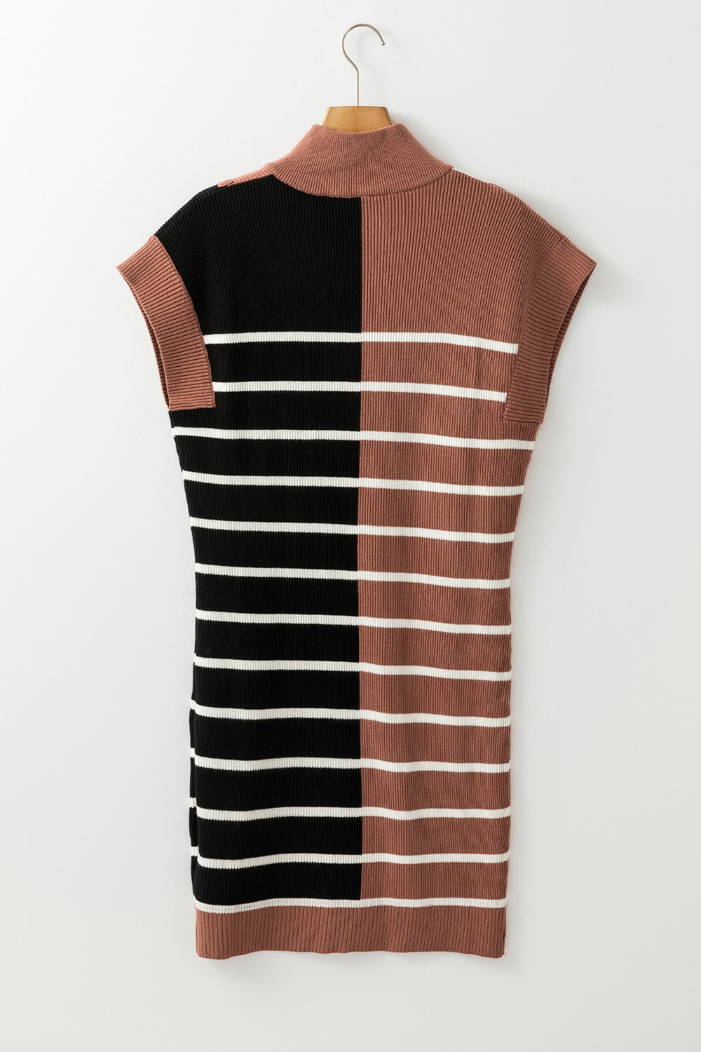 Colorblock ribbed mini dress in terracotta and black with white stripes and mock neck.