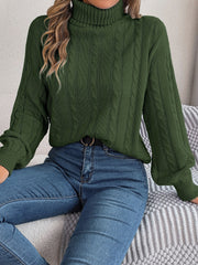 Dark green cable knit turtleneck sweater with voluminous sleeves
