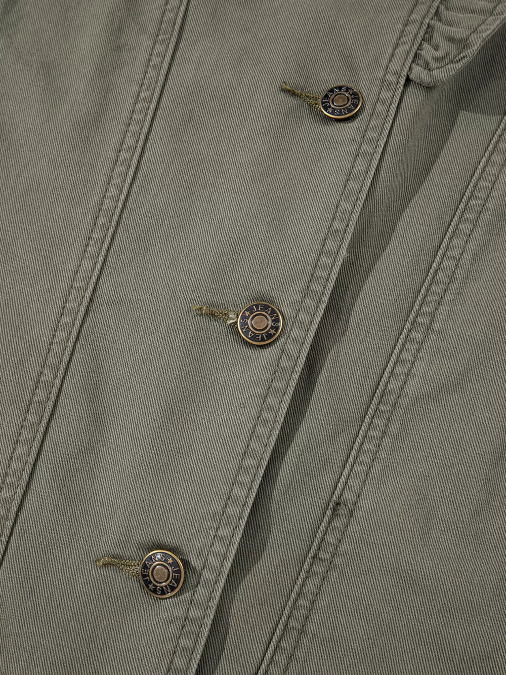Ruffled denim vest in olive green with button closure and branded metal buttons.
