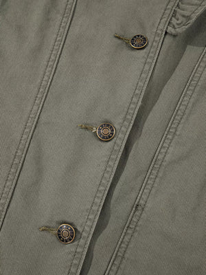 Ruffled denim vest in olive green with button closure and branded metal buttons.