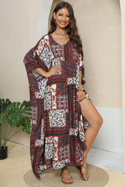 Patchwork caftan maxi dress in mixed floral prints and deep red, white, and navy.