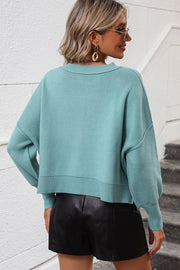 Teal cropped dolman sleeve knit sweater with ribbed collar, cuffs, and hem