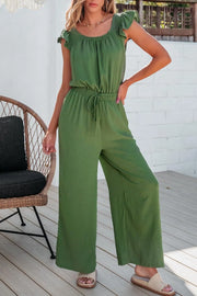 Matcha green textured drawstring palazzo jumpsuit with ruffle sleeves and wide legs.