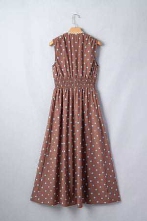 Taupe polka dot midi dress with smocked waist and lace trim neckline.