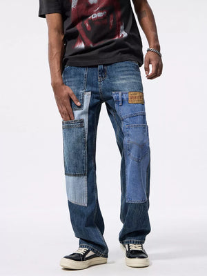 Relaxed fit patchwork jeans in blue denim with distressed details and cargo pockets.