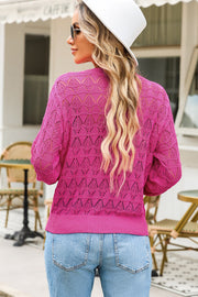 Openwork knit cardigan in Deep Rose with balloon sleeves and intricate lace pattern.