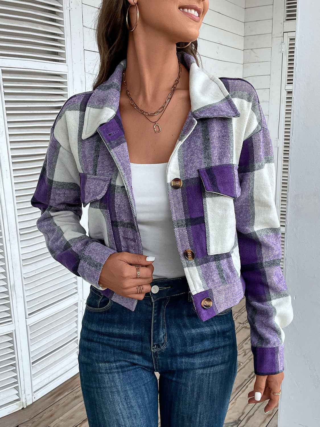 Checked plaid shacket in deep purple with patch pockets and button closure.