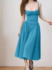Cerulean sweetheart midi dress with spaghetti straps and full skirt