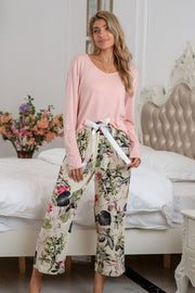 Botanical print lounge set with tie waist pants and long sleeve dusty pink top.