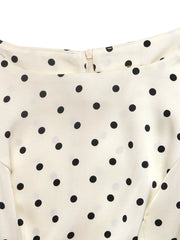 Cream polka dot peplum blouse with zipper detail
