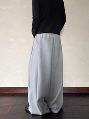 Men's relaxed fit grey sweatpants with elastic waist and back pockets.