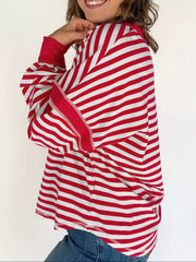 Red and white striped V-neck sweatshirt with cotton fabric and long sleeves.