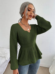 Green peplum knit sweater with scallop neckline and long sleeves