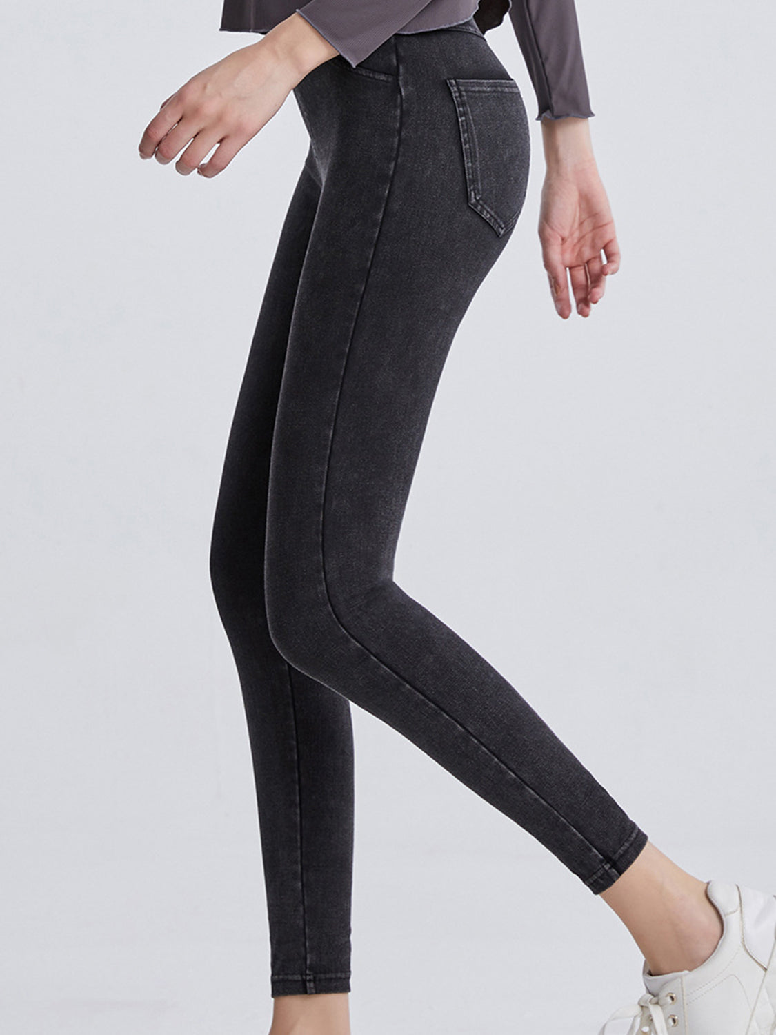 Charcoal denim illusion sculpt leggings with back pocket detail.