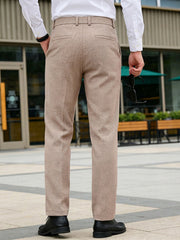 Classic fit men's khaki dress pants with a subtle herringbone pattern and two back pockets.