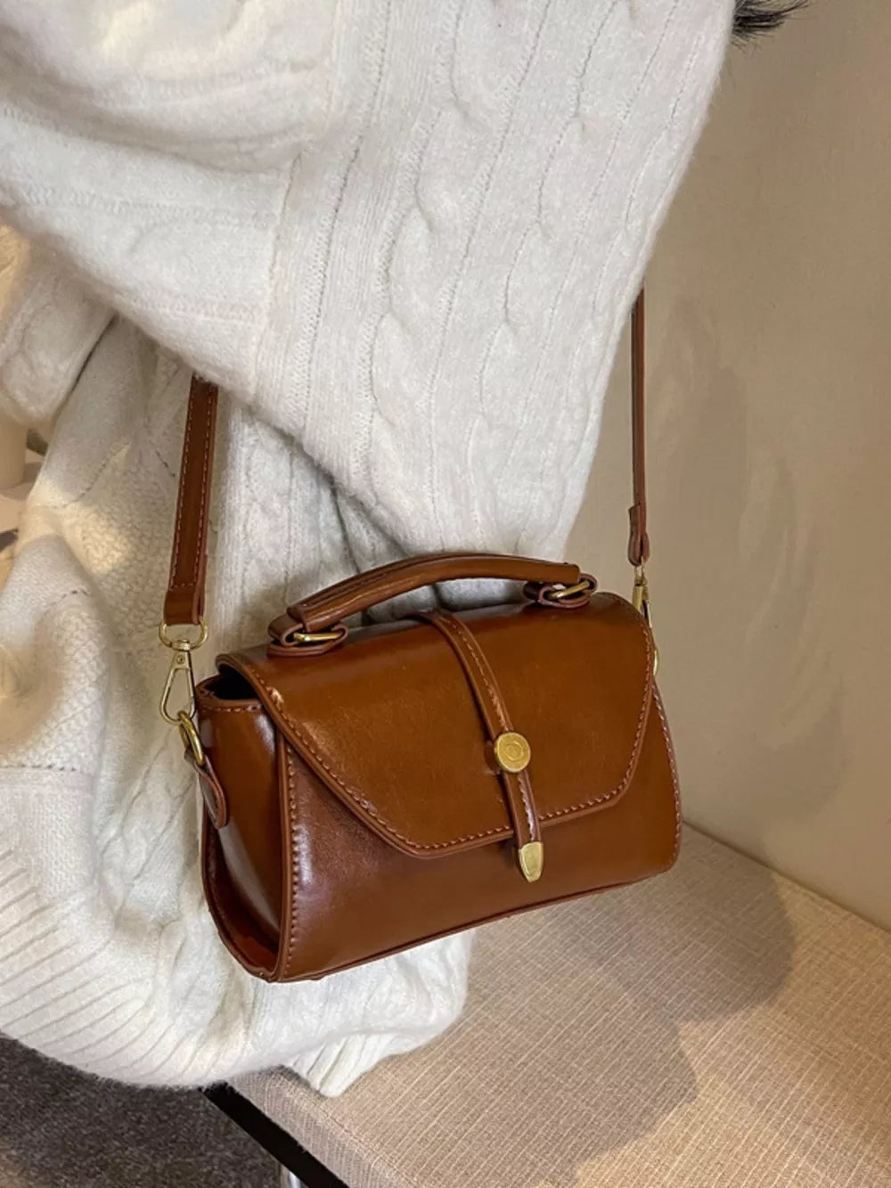 Mini brown pu leather crossbody bag with gold clasp and top handle