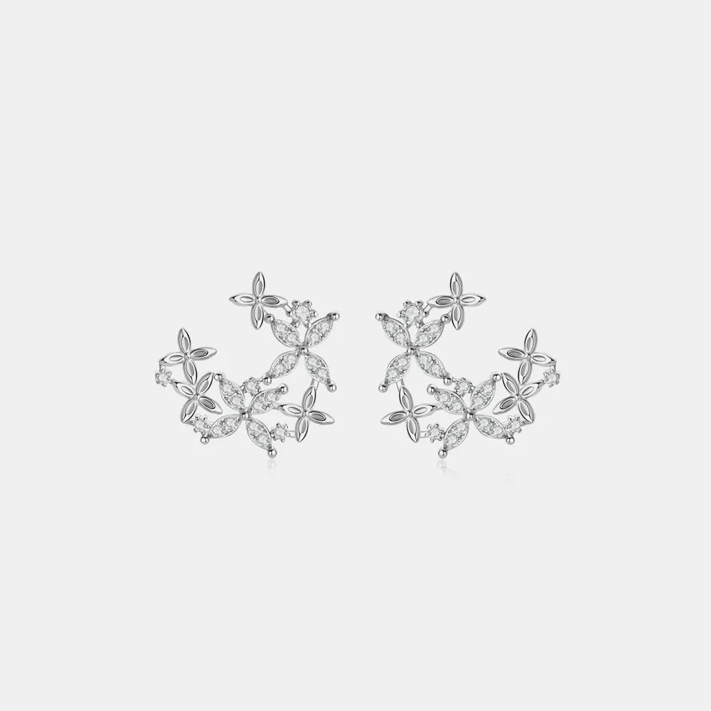 Silver floral cluster stud earrings with clear stones