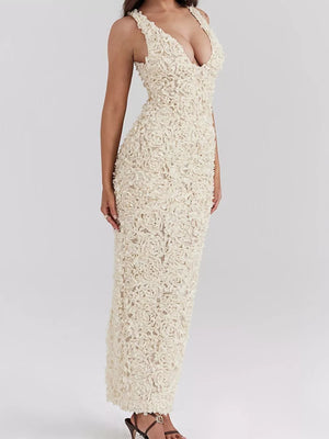 Cream floral applique maxi dress with plunging neckline and sleeveless design.