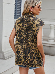Leopard print denim utility vest with a collared neckline and sleeveless cut.