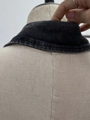 Gathered denim halter top with collar in black, showing collar detail and buttoned back.