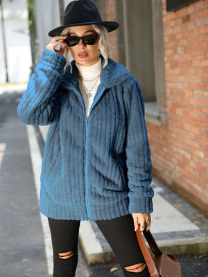 Plush ribbed collar zip-up jacket in Misty Blue with a relaxed fit and zip pockets.