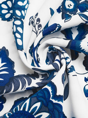 Charming floral midi dress in dark blue and white with a drawstring waist.