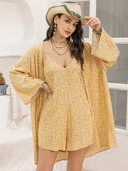 Yellow floral romper and kimono cover-up set with V-neck romper and wide sleeves.