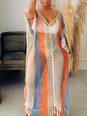 Vibrant striped crochet cover-up dress with fringe hem and V-neck.