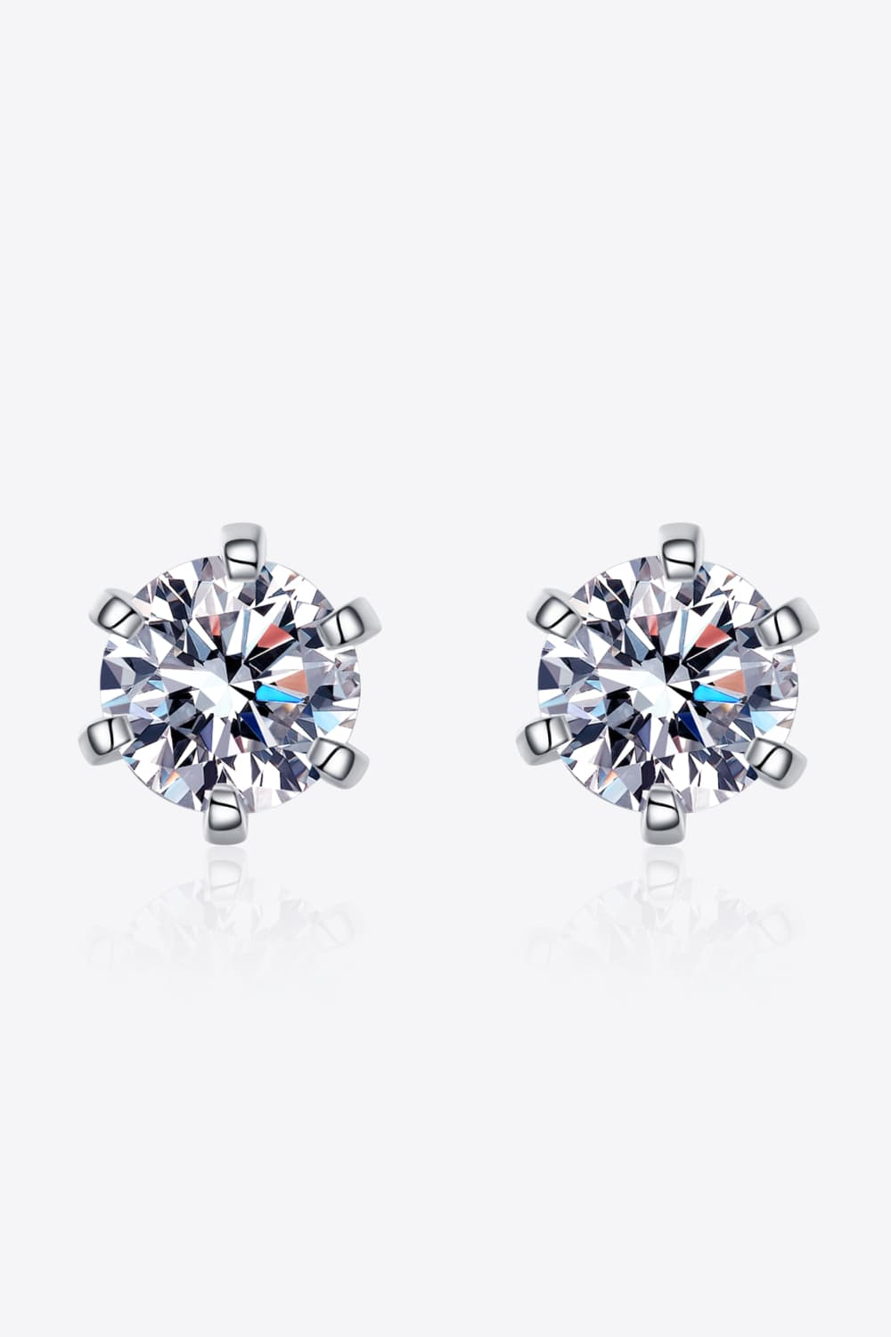 Silver six-prong solitaire stud earrings with clear cubic zirconia gems