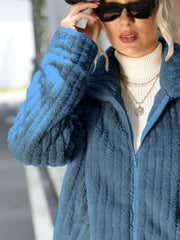 Plush ribbed zip-up jacket in Misty Blue with a collared neckline.