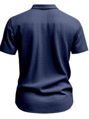 Navy blue classic short sleeve button-down shirt with subtle textured fabric and collar.