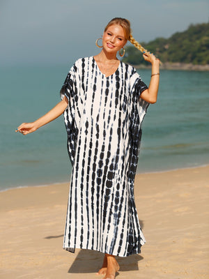 Black tie-dye maxi kaftan dress with vertical stripes and V-neck.