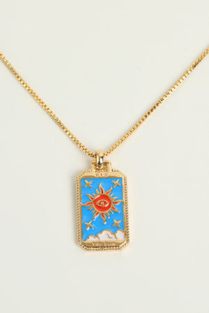 Celestial tarot pendant necklace in Sun color with gold chain and sun eye design