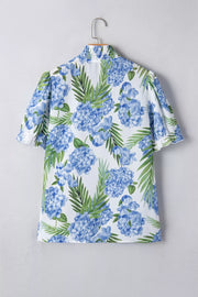 White short sleeve blouse with blue hydrangea floral print and smocked collar.