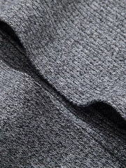 Heathered gray longline cardigan with pockets, showing knit texture.