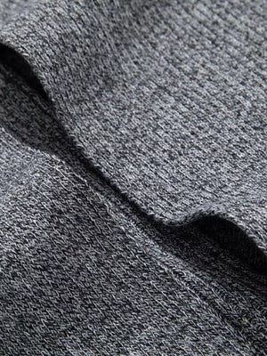Heathered gray longline cardigan with pockets, showing knit texture.
