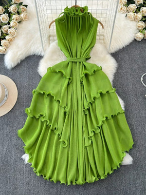 Lime green ruffled tiered midi dress with belted waist and frill neckline.