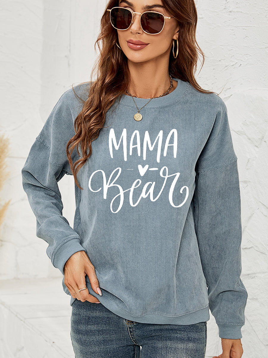 Textured corduroy sweatshirt in French Blue with white "Mama Bear" graphic and heart detail.