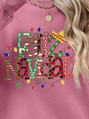 Feliz Navidad graphic raglan sweatshirt in Blush Pink with festive lights and sombrero detail.