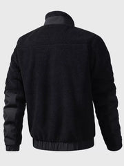 Black sherpa fleece zip-up jacket with contrast nylon sleeves and collar.