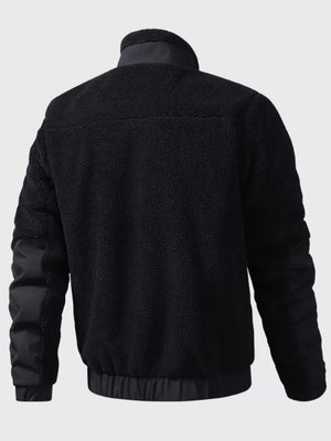 Black sherpa fleece zip-up jacket with contrast nylon sleeves and collar.
