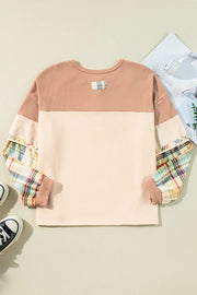 Raglan plaid cuff henley top in tan with waffle knit and contrast sleeves.
