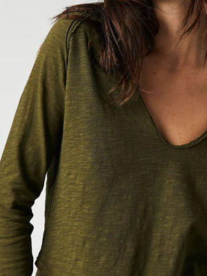 Army green distressed slouchy long sleeve tee with a deep plunge neckline.