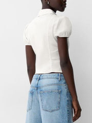 White puff sleeve button-up shirt with collar and short sleeves.