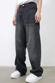 Dark gray wide leg denim jeans with a faded wash and relaxed fit.