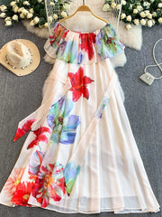 White off-shoulder A-line dress with a vibrant floral print and a matching belt.