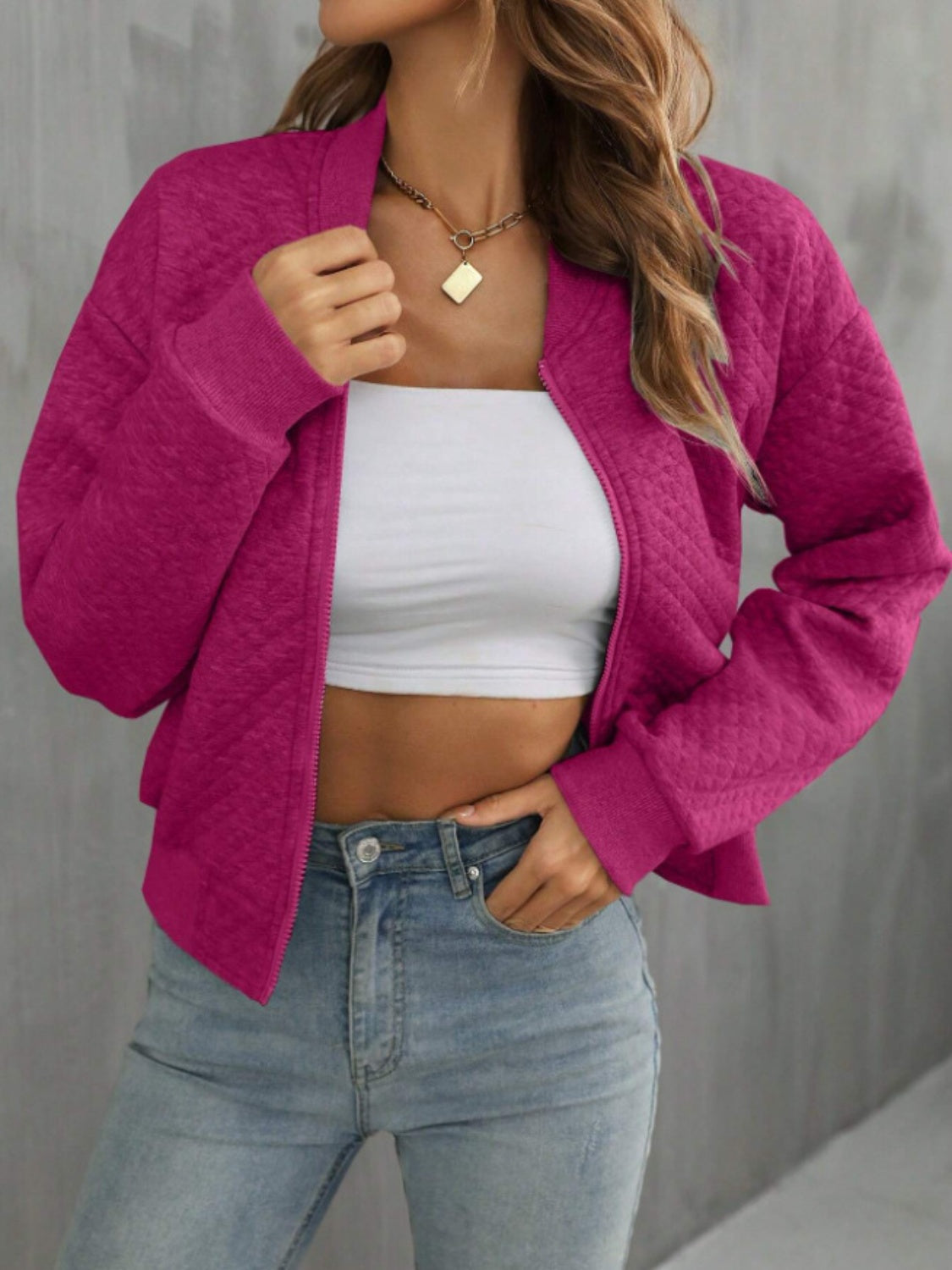 Diamond quilted bomber jacket in Deep Rose with zip front and ribbed cuffs.