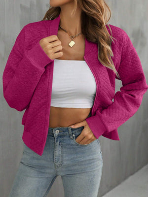 Diamond quilted bomber jacket in Deep Rose with zip front and ribbed cuffs.