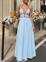 Blue striped halter maxi dress with brown trim and a-line skirt.
